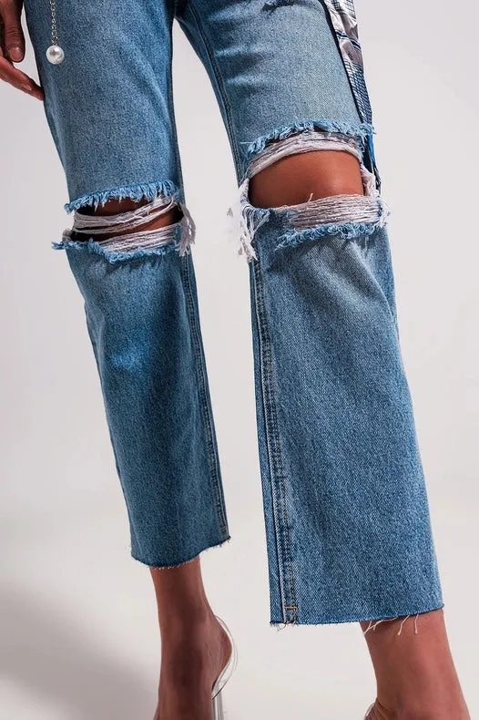 Ripped Knee Jeans In Light Blue